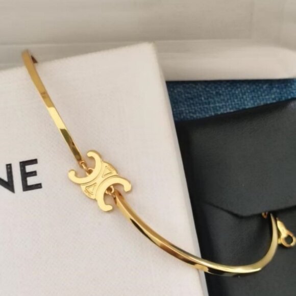 Celine Gold-Tone Modern Wrist Jewelry - Picture 2 of 6